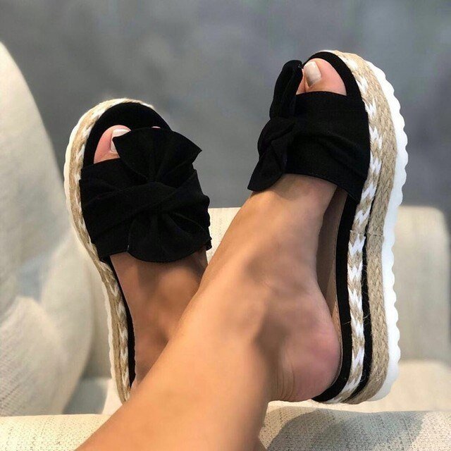 Women's beige woven wedge sandals with bow detail and platform heel