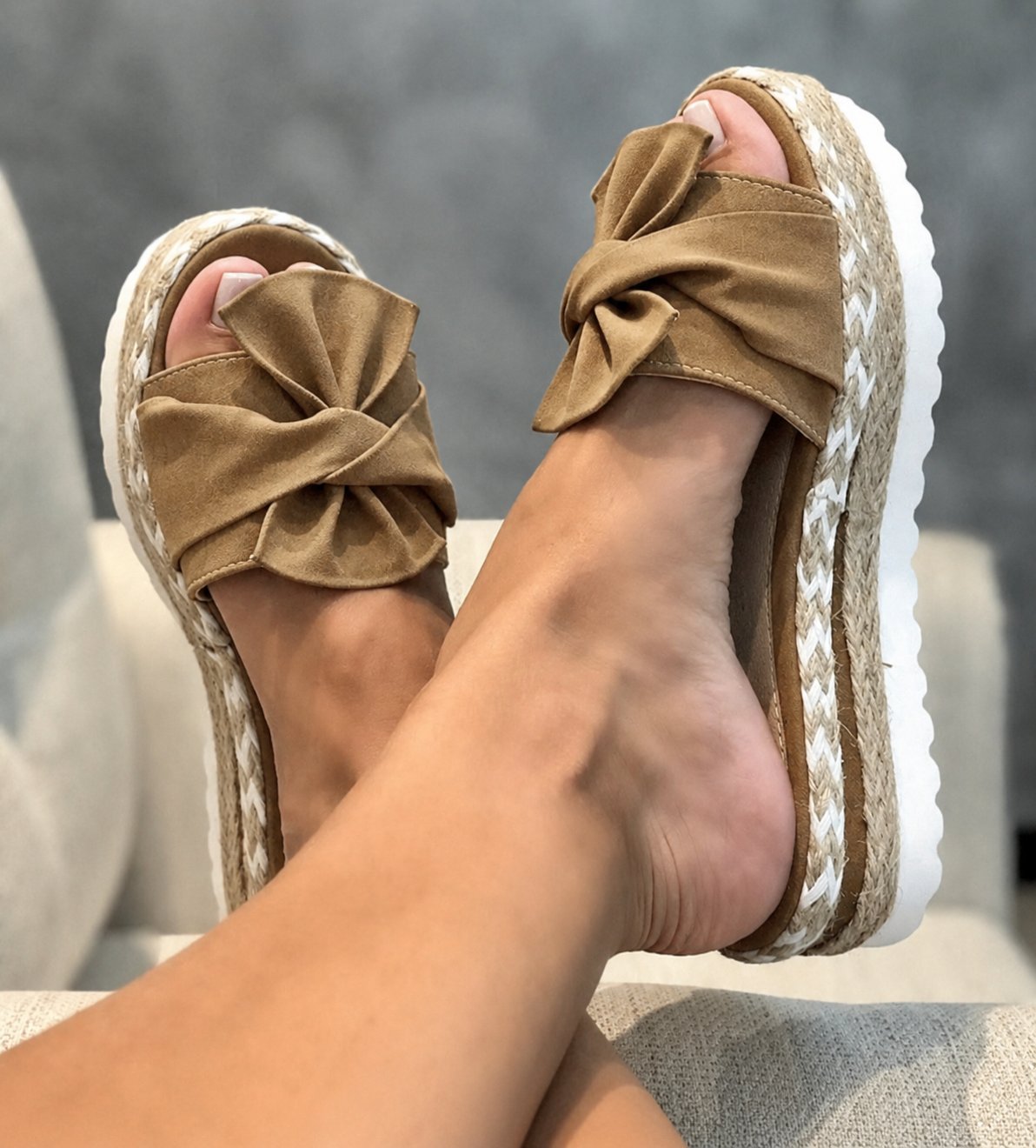 Women's beige woven wedge sandals with bow detail and platform heel