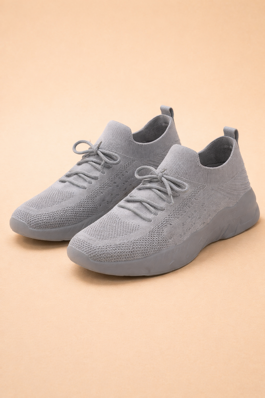 Women's red slip-on knit sneakers with cushioned sole