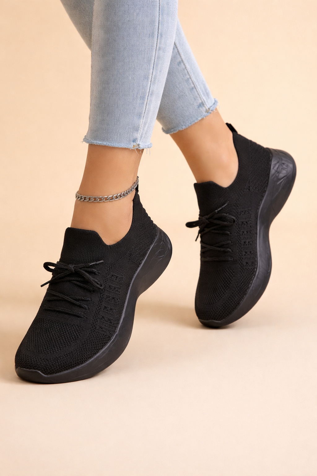 Women's red slip-on knit sneakers with cushioned sole