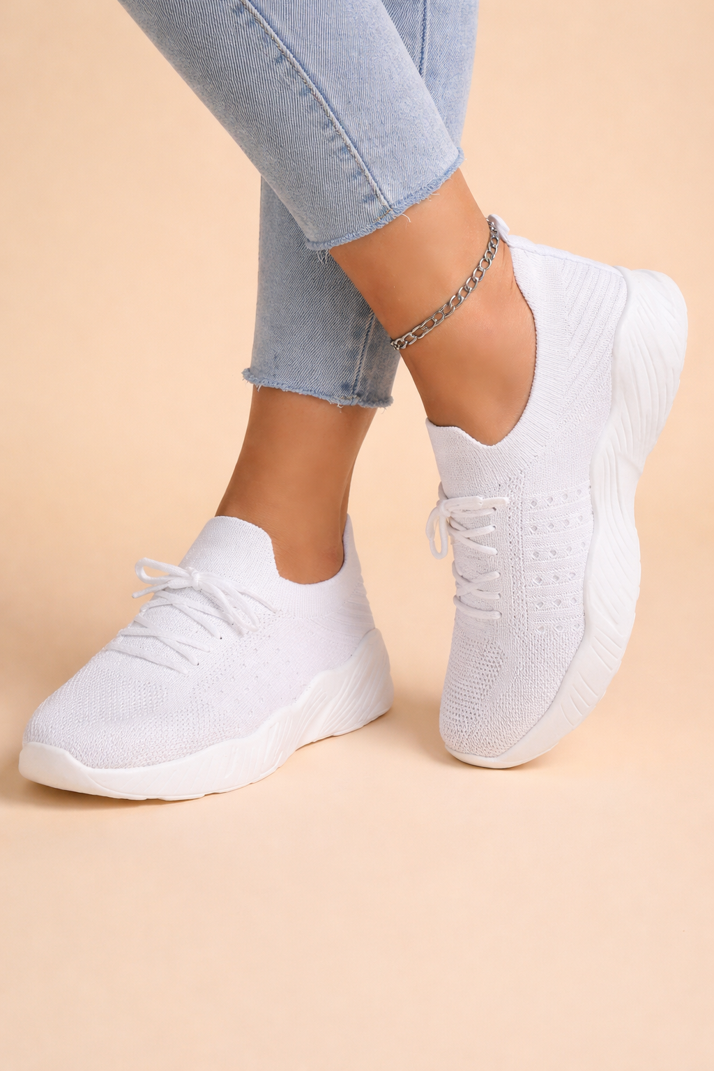Women's red slip-on knit sneakers with cushioned sole