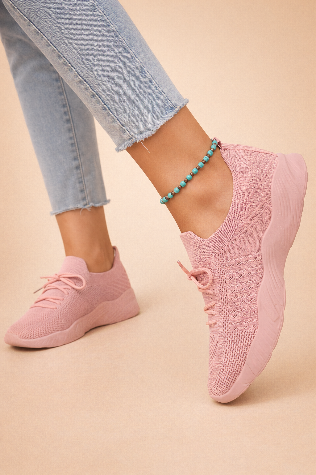 Women's red slip-on knit sneakers with cushioned sole