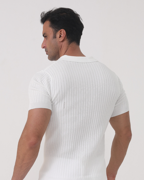 Men's white ribbed polo shirt with textured knit and classic collar