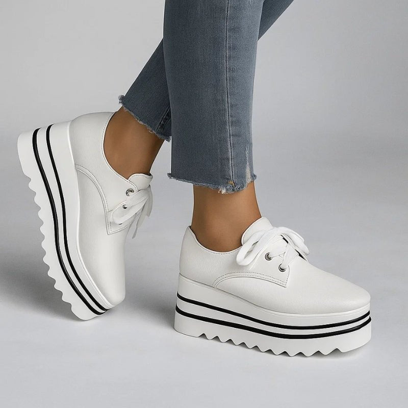Women's beige lace-up platform oxford shoes on striped wedge sole