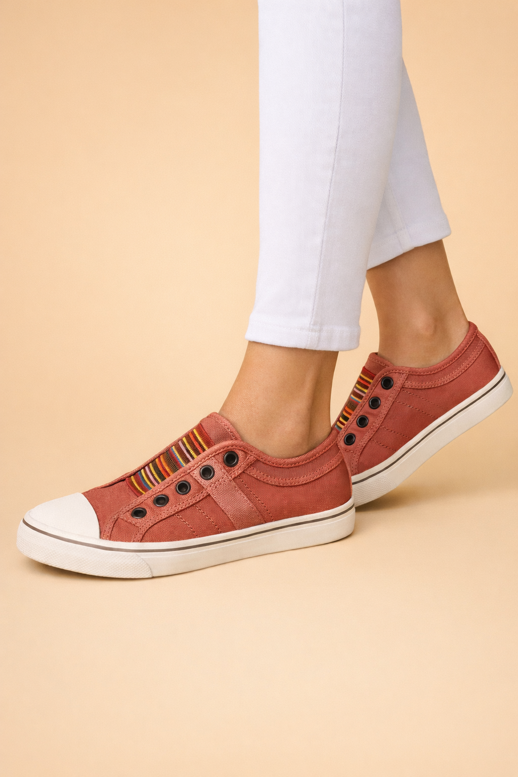 Women's blue slip-on sneakers with breathable knit upper