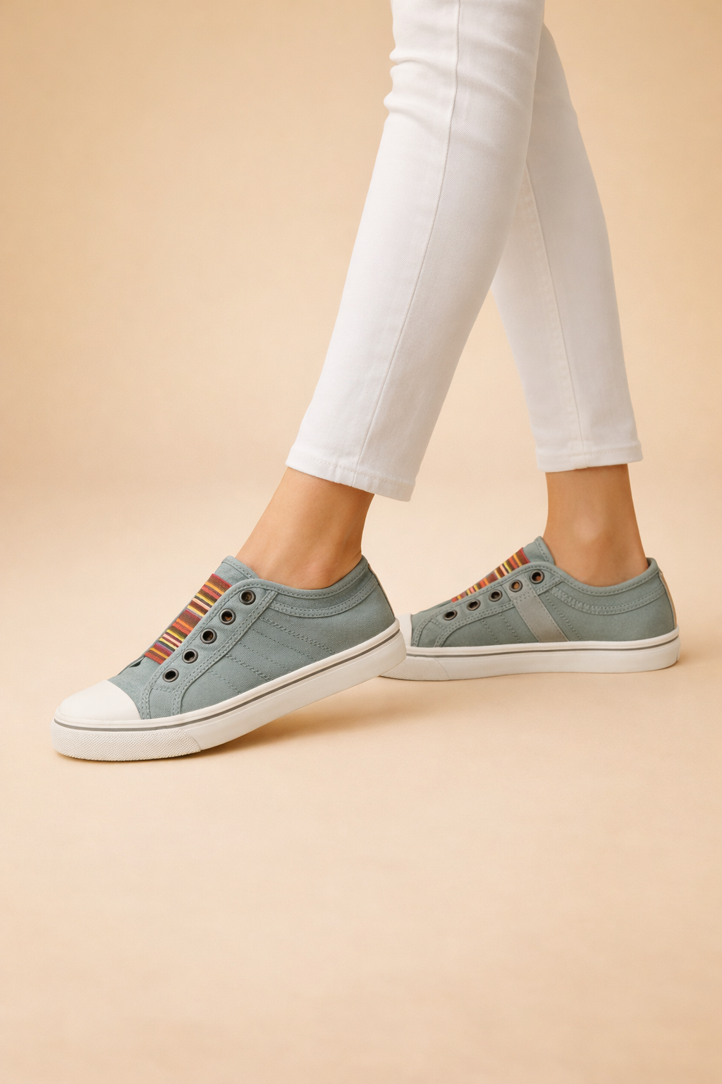 Women's blue slip-on sneakers with breathable knit upper