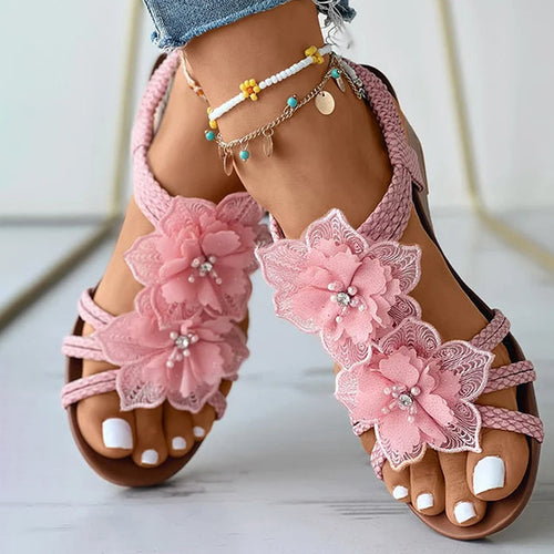 Women's pink floral wedge sandals with mid heel and open toe