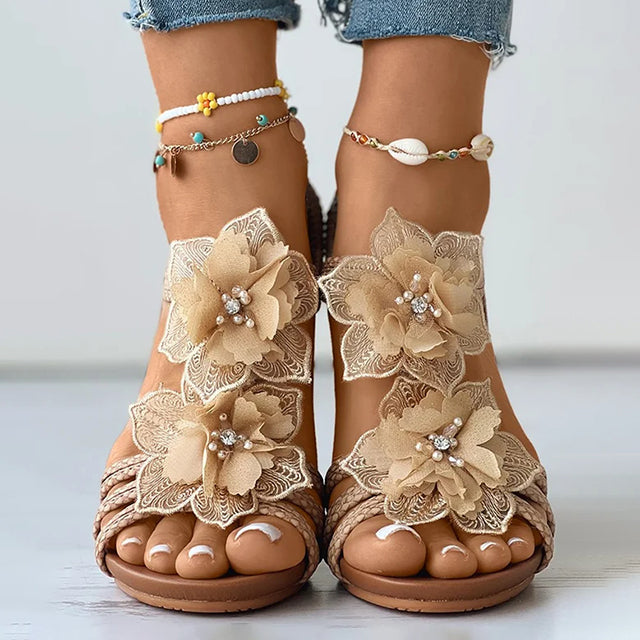 Women's black floral wedge sandals with mid heel and open toe