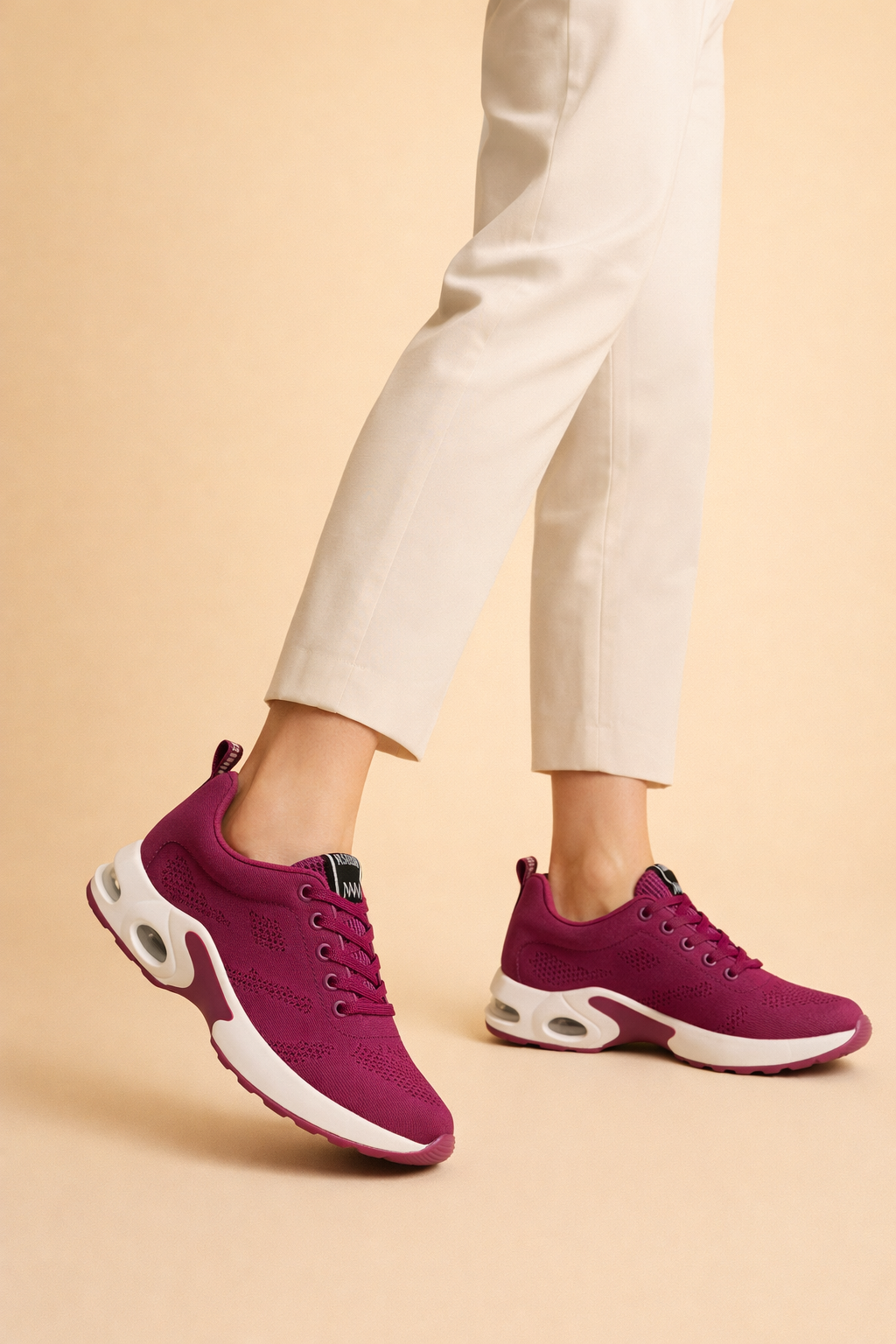 Women's black lightweight sports trainers with breathable knit upper