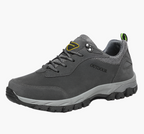 Men's grey waterproof hiking shoes with deep tread grip outsole