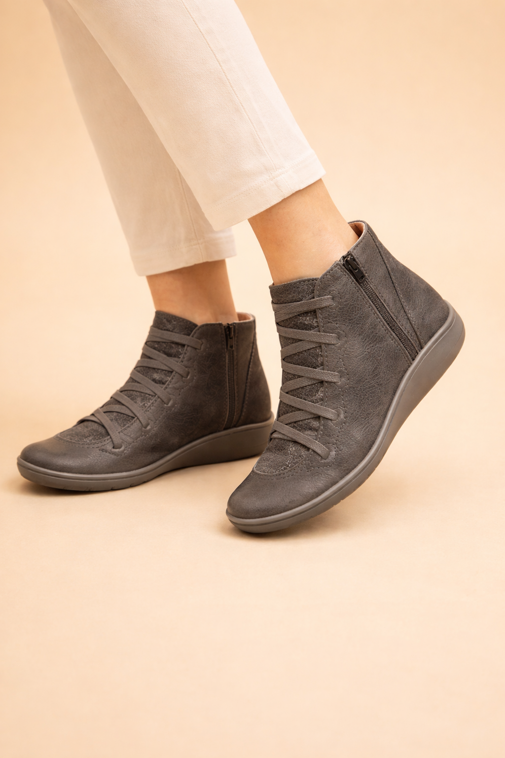 Women's brown ankle boots with low block heel and round toe