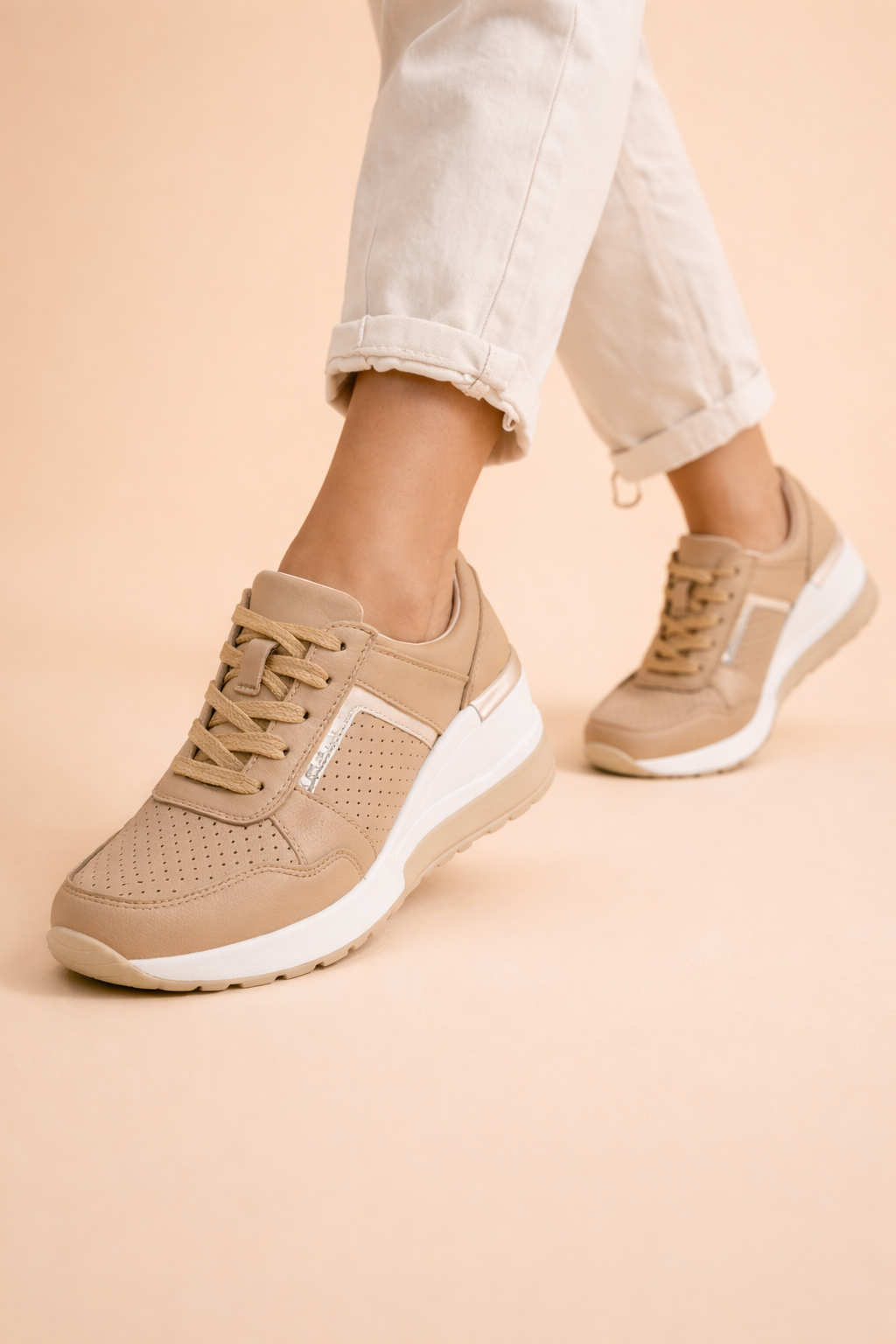Women's white hidden wedge sneakers with perforated lace-up upper