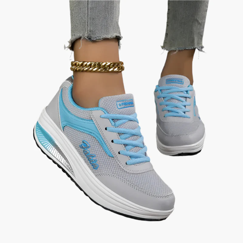 Women's black comfort sneakers with air cushion sole and lace-up upper