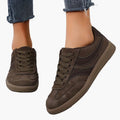 Women's brown retro low top sneakers with vintage style upper