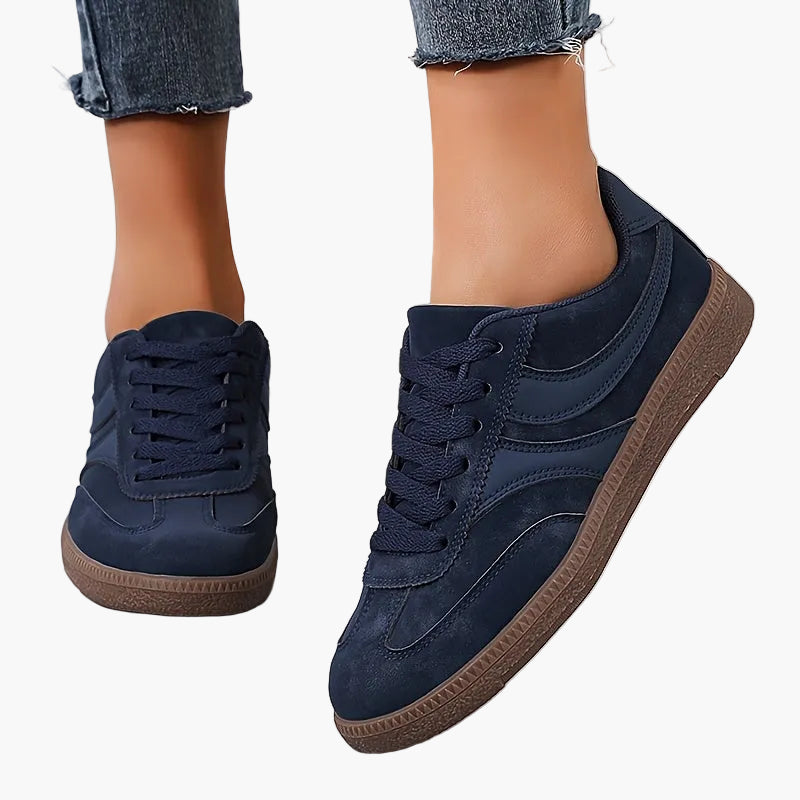 Women's brown retro low top sneakers with vintage style upper