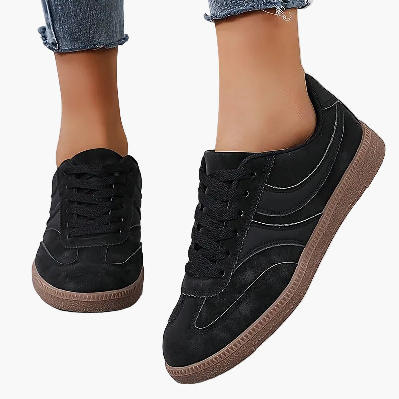 Women's brown retro low top sneakers with vintage style upper